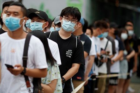بكين تخفض مستوى استجابة الطوارئ لأزمة كوفيد-19